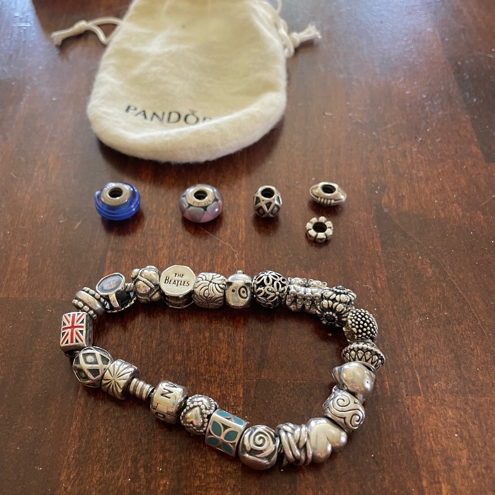 Pandora silver bracelet, including charms